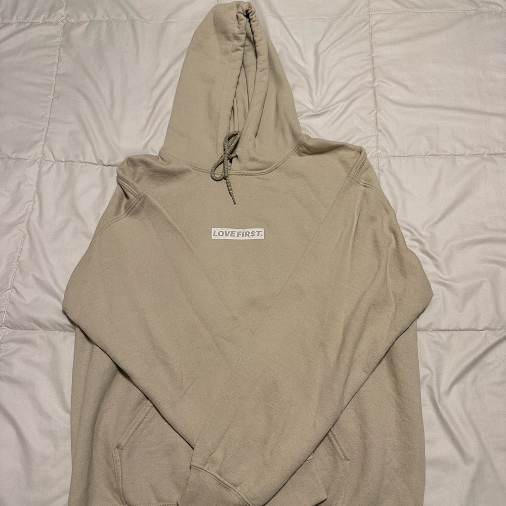 Love First hoodie